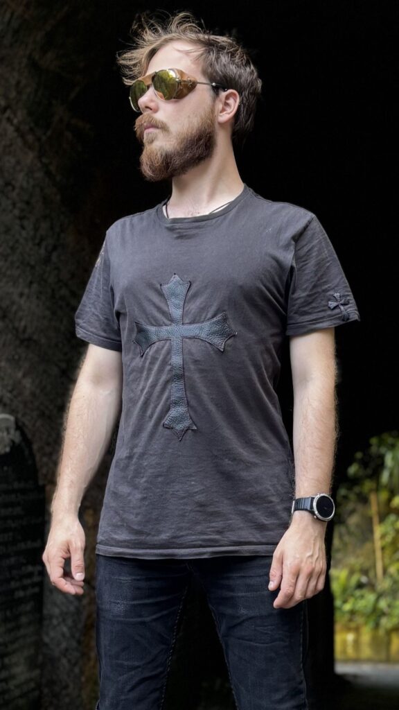 Goth cross - black t-shirt with a large leather gothic cross, worn